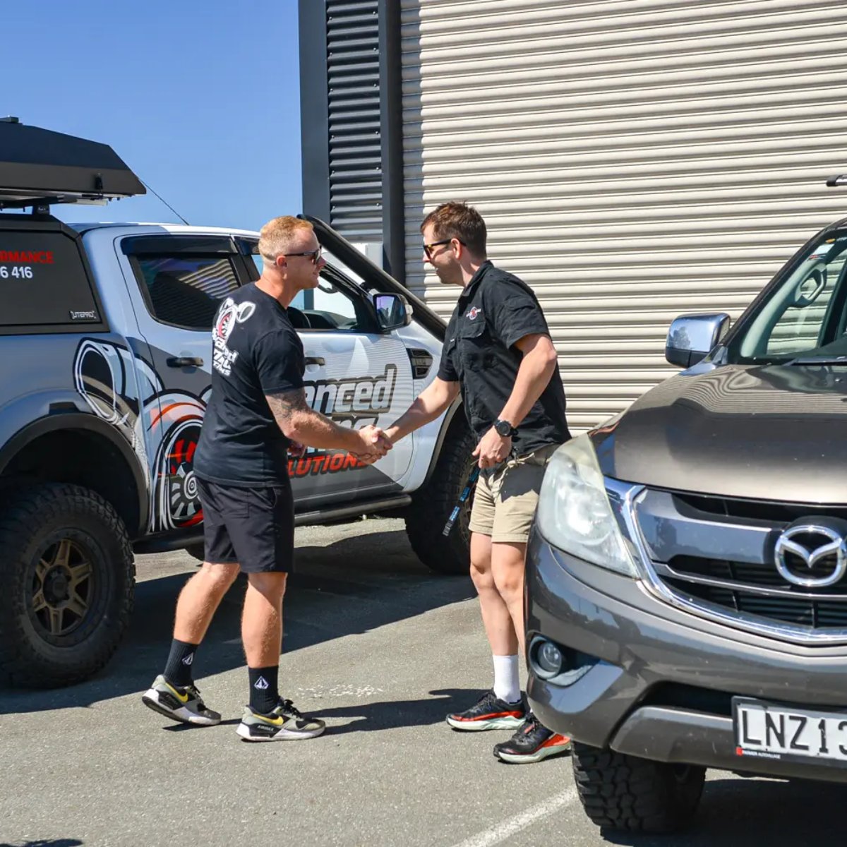 Dave going through a fleet vehicle list with an operator on site