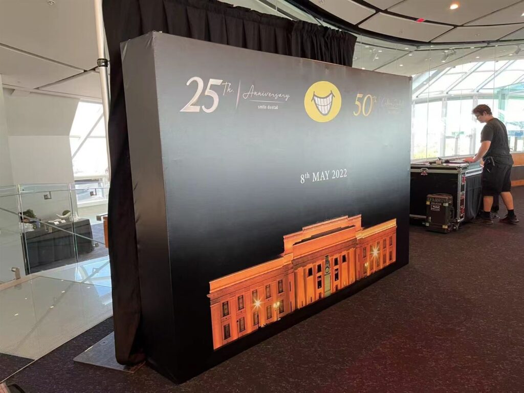 Printed event backdrop being set up