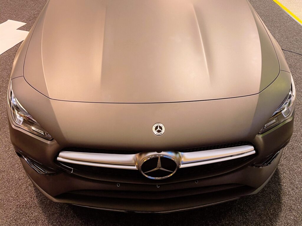 Coupe in a matte grey wrap, bonnet and grille