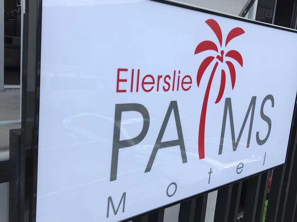 Printed panel sign for a motel