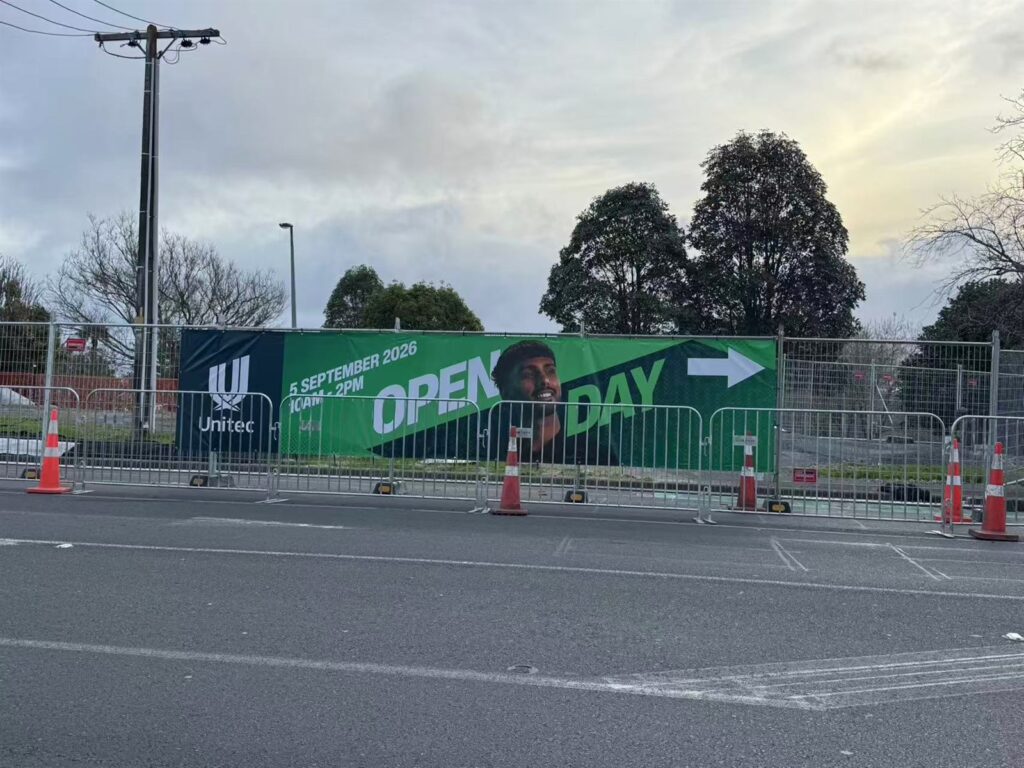Printed fence banner for an outdoor event