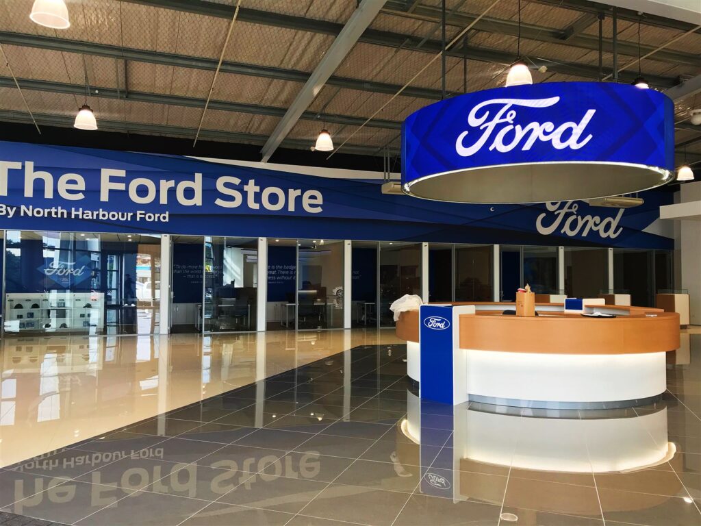 Car showroom reception fitted out with branded signage