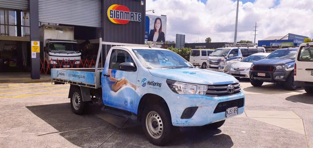 Tray ute wrapped in printed graphics