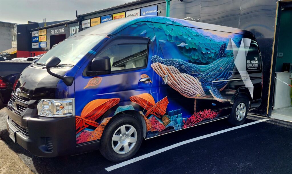 Van in a full colour printed wrap, applied by Signmate