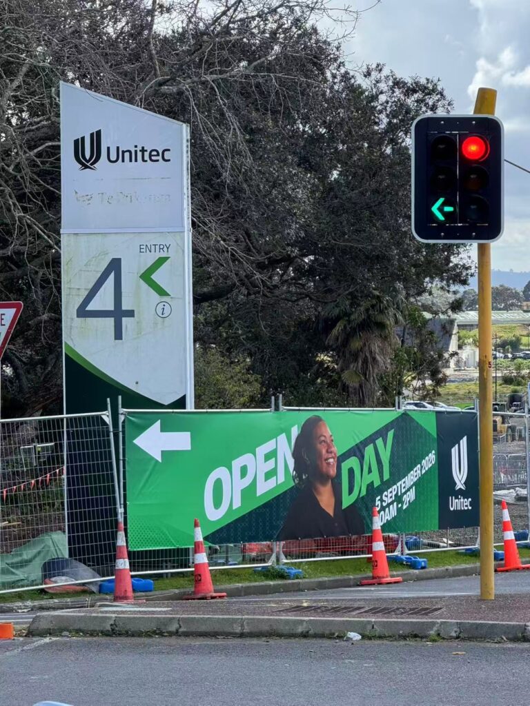 Wayfinding pylon and directional signage by Signmate